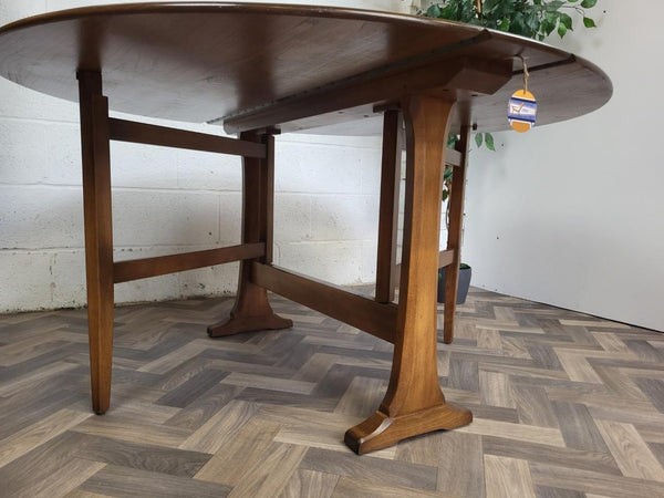 Vintage Ercol Dropleaf Gateleg Oval Dining Table Model 610 Dark Stain Elm